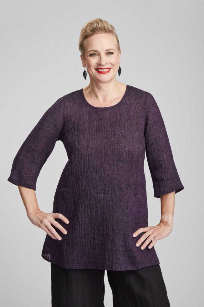 Pellavapaita luumu taskuilla